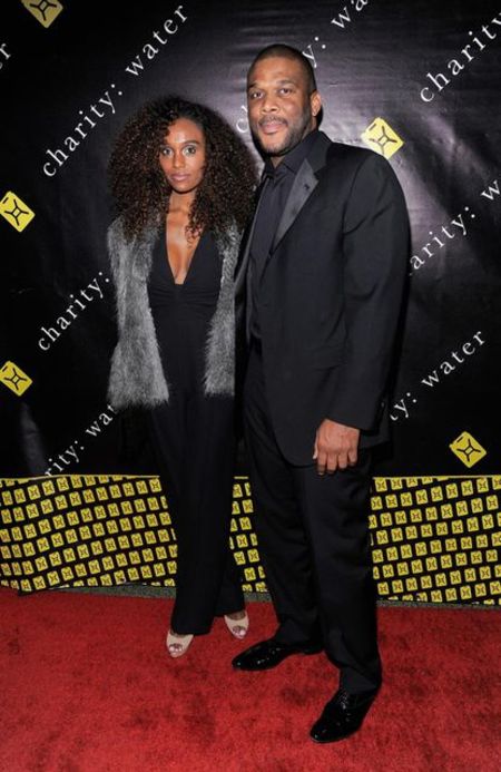 Gelila Bekele poses a picture with Tyler Perry at a public event.